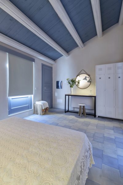 Italy, Sicily, Ragusa Province, countryside; 1 August 2015, elegant private house, bedroom - EDITORIAL